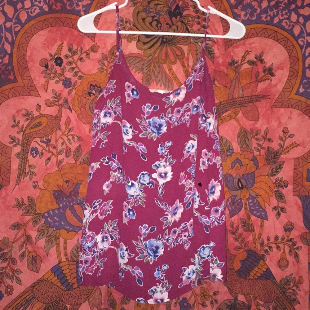 Floral print shirt.